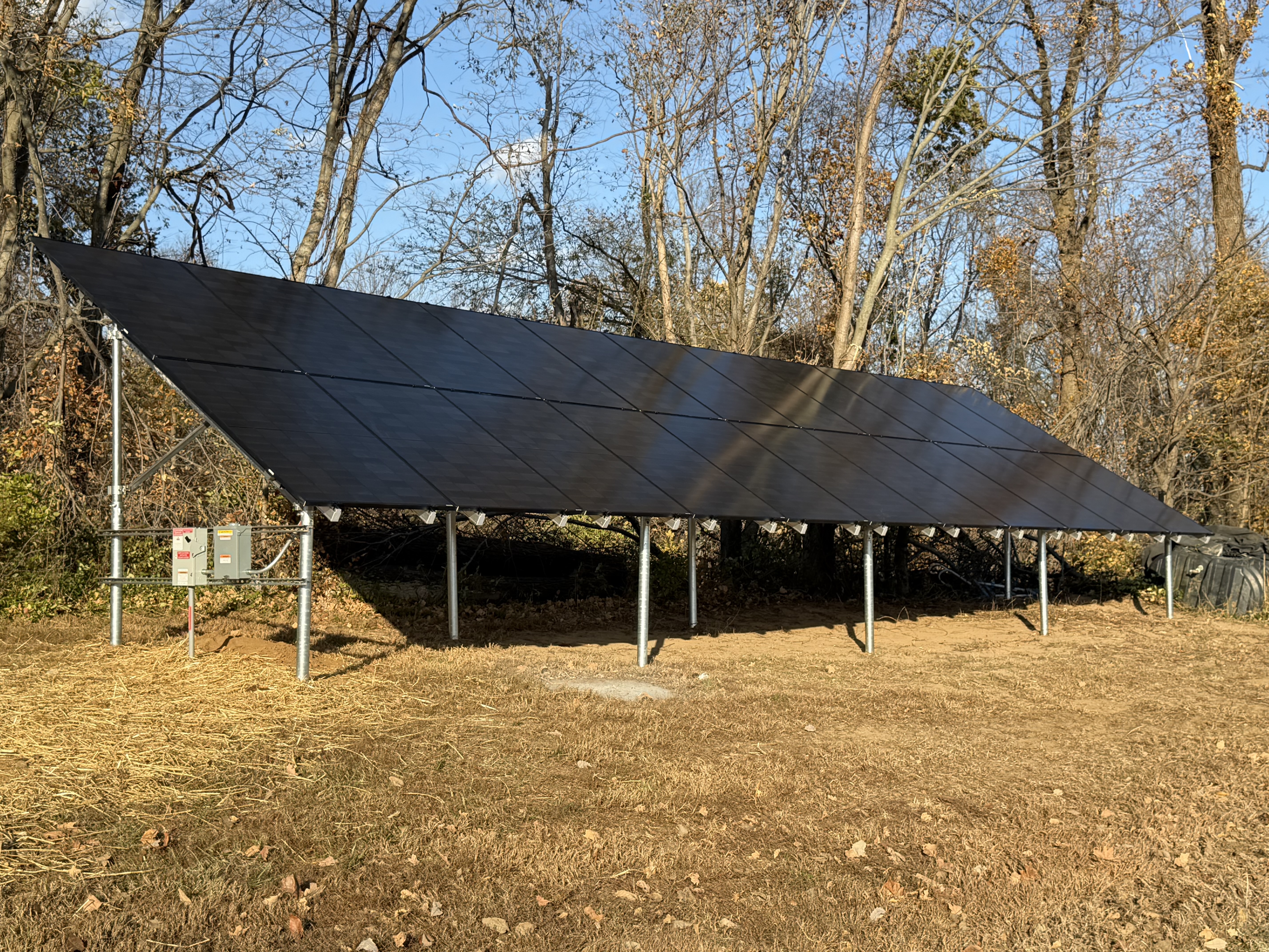 Residential roof with completed solar panel installation